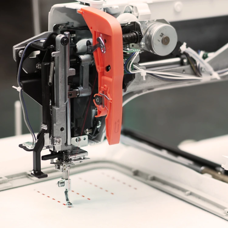 Outgoing quality inspection of EOC06 embroidery machine.